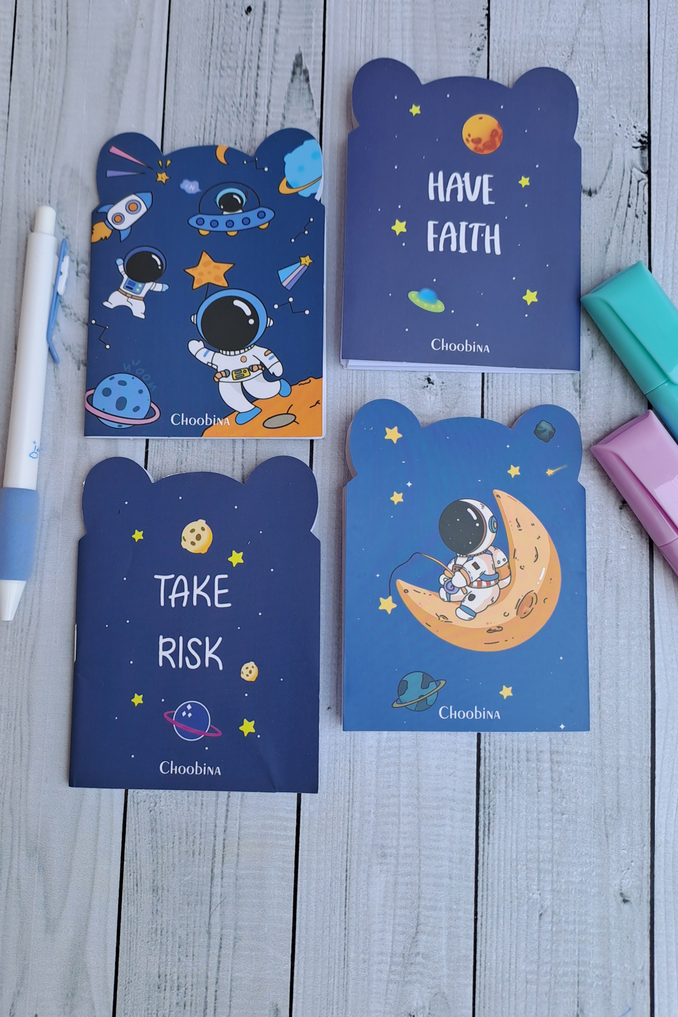 دفترچه پاسپورتی گوش دار فضانورد